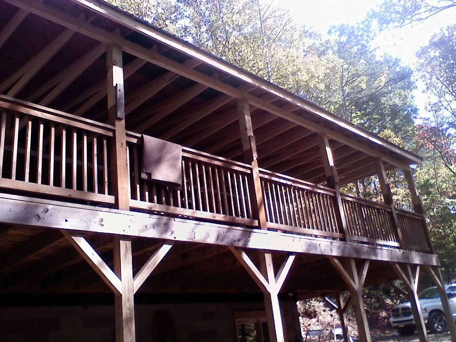 Timber framing under a new elevated porch and deck — Roof Leak Repair in Zumbrota by Roofing Brothers